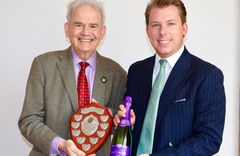 Julian receiving Chairman’s Award from James.